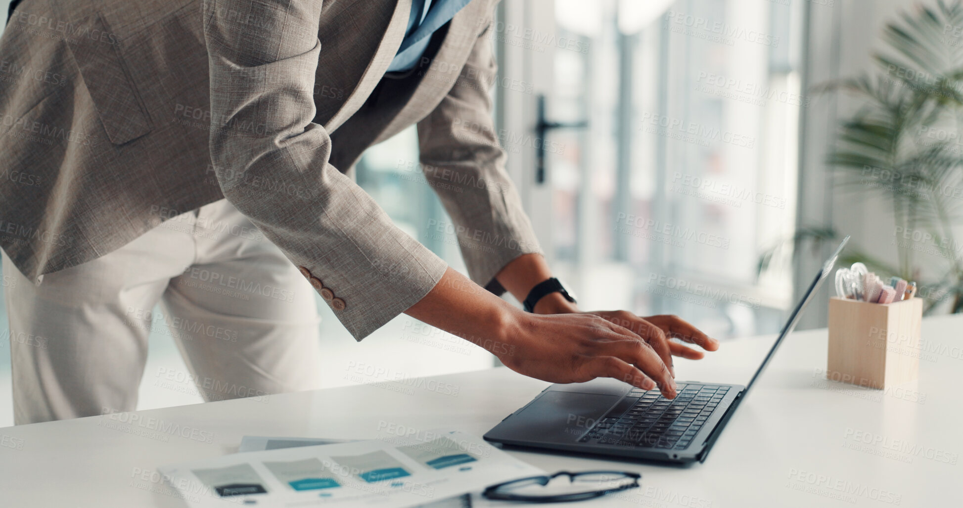 Buy stock photo Hands, paperwork and businessman typing on laptop for finance report, performance review or research. Financial analyst, charts and tech in office for investment proposal, budget forecasting or email