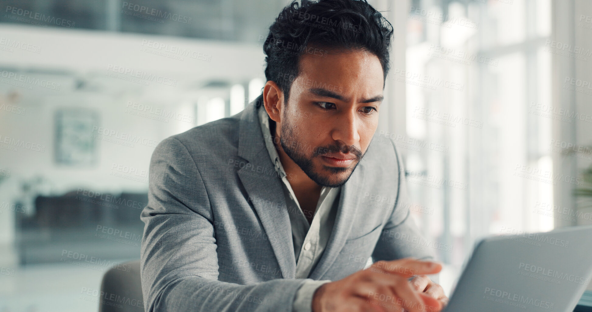 Buy stock photo Reading, research and laptop with business man in office for planning, broker review and stakeholder pitch. Investor proposal, bookkeeping or account update with employee in agency for report