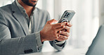 Phone, hands and businessman in office with networking, communication or email on mobile app. Typing, technology and male person with cellphone for contact, texting or research online in workplace.