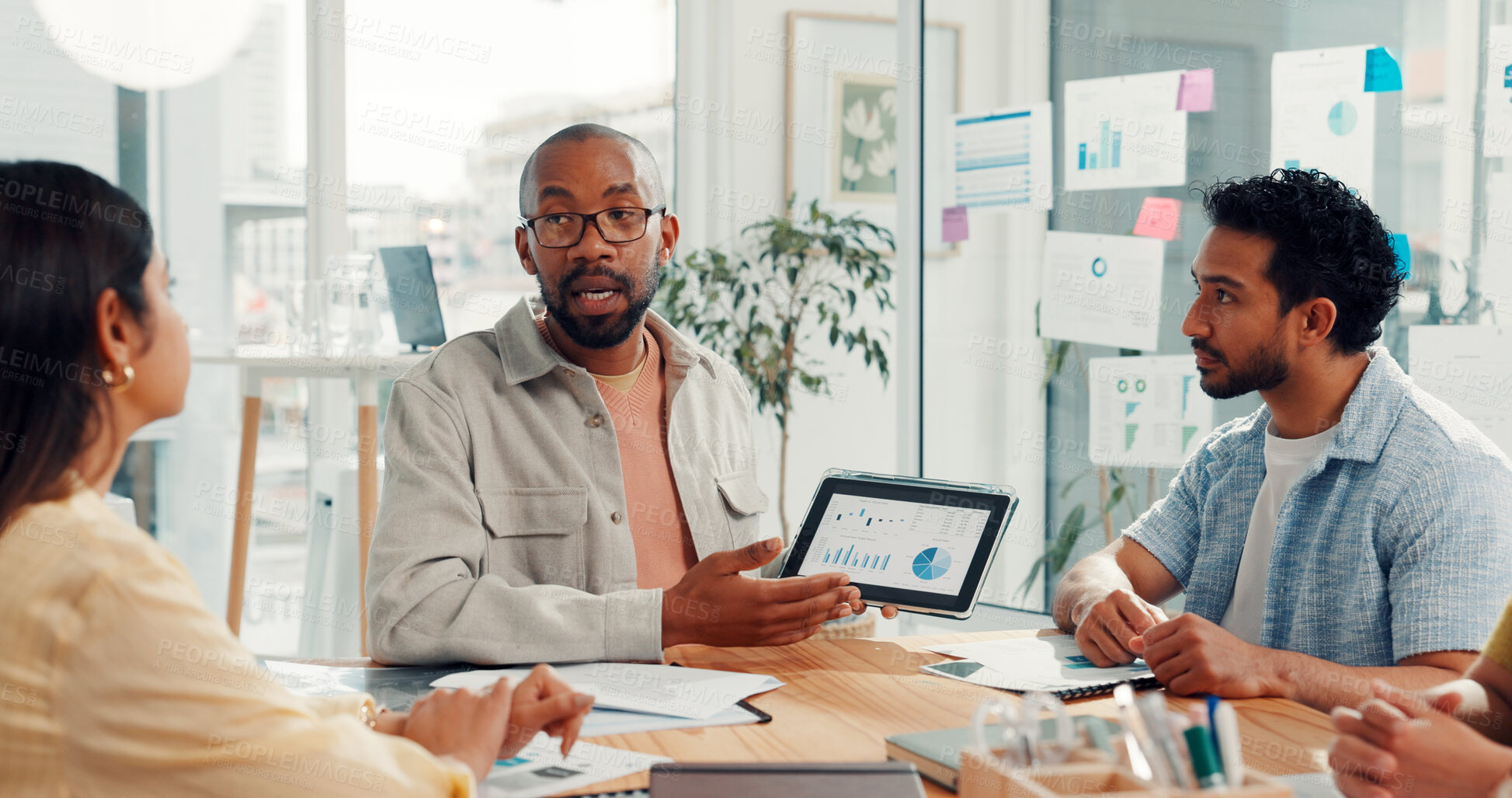 Buy stock photo Tablet, meeting and business people with statistics, kpi research and data analysis in office. Teamwork, startup agency and workers on digital tech with graph, chart and seo report for website growth