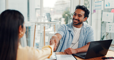 Buy stock photo Happy, businessman or handshake with laptop for interview, hiring or job opportunity in office. Man, woman or shaking hands with candidate for recruiting, onboarding process or agreement in workplace