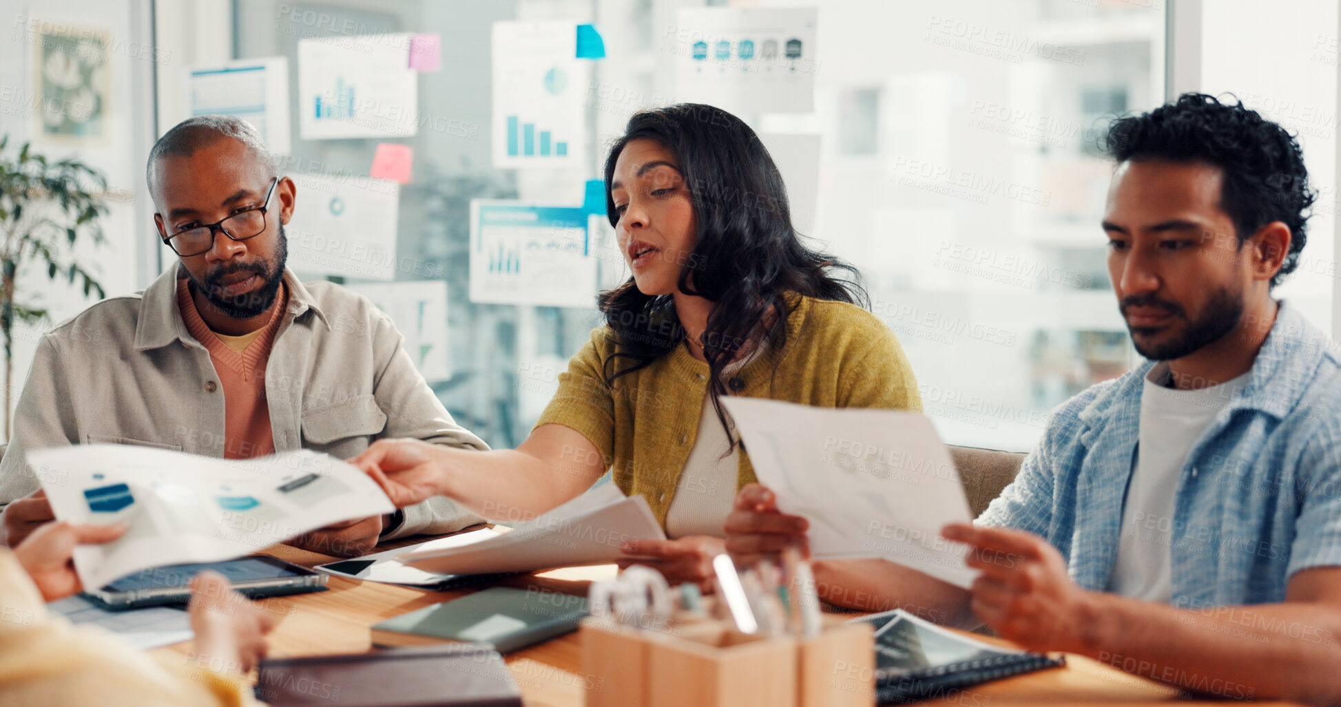 Buy stock photo Business, meeting and team with documents in office for campaign oversight, KPI data or planning. Marketing manager, people or SEO graphs or track user behavior, competitor analysis or brand strategy