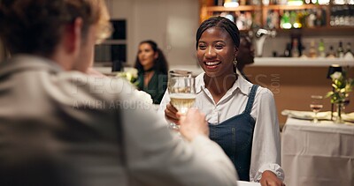 Buy stock photo Couple, dating and smile in restaurant with toast for wine, romance or anniversary celebration. Hospitality, conversation and fine dining with man, woman and cheers with diner discussion and bonding