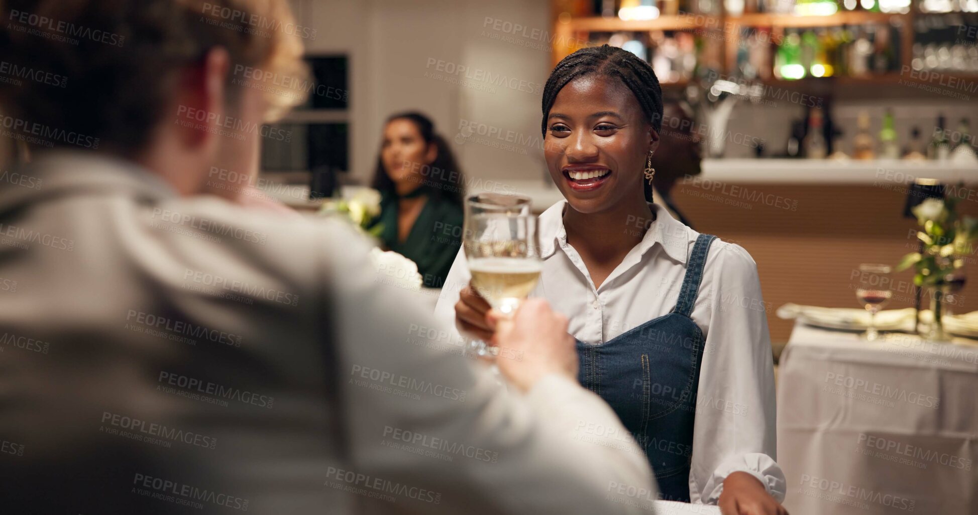 Buy stock photo Couple, dating and smile in restaurant with toast for wine, romance or anniversary celebration. Hospitality, conversation and fine dining with man, woman and cheers with diner discussion and bonding