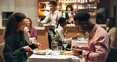 Buy stock photo Couple, eating dinner and night at restaurant on date, bonding or happy for fine dining with lasagna. Woman, man and relationship, food and gourmet meal with customer experience with cuisine at diner