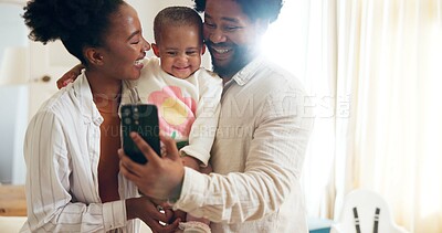 Buy stock photo Smile, black family and selfie with baby at house for photography, social media post and bonding. Happy, parents and profile picture update with kid, memory together and wellness of child development