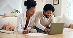 Budget, documents and laptop with black couple on sofa in living room of home for finance review. Computer, conversation and financial planning with African people in apartment for investment