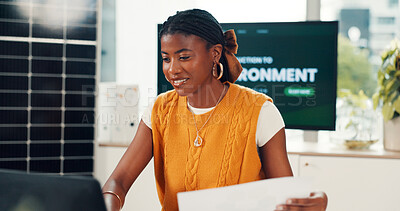 Buy stock photo Black woman, document and typing on laptop in office for results, energy saving stats and sustainable. Person, pc and paperwork on photovoltaic grid revenue, company performance and solar panel sales
