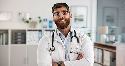 Buy stock photo Portrait, doctor and man in hospital, arms crossed and career ambition with smile. Happy person, medical service or professional in clinic, healthcare and confidence with support, pride or cardiology