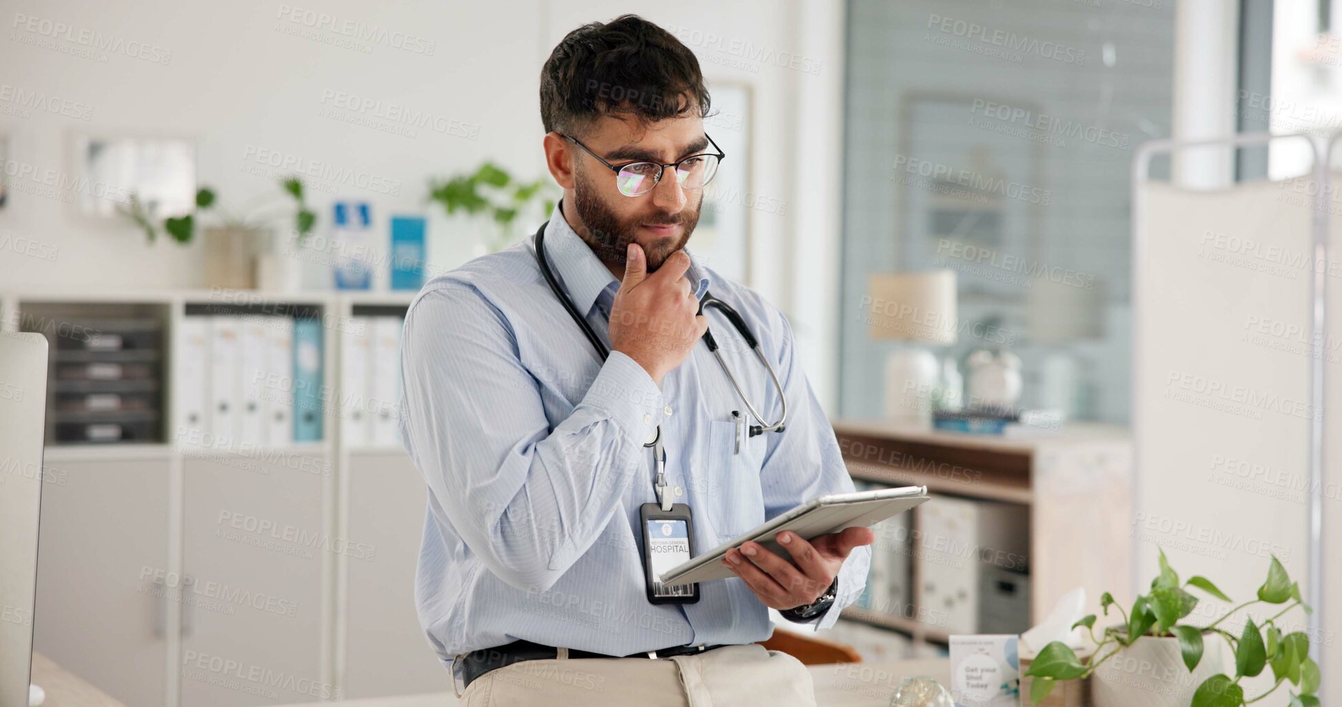 Buy stock photo Healthcare, tablet and thinking with doctor in hospital for planning, research or review of records. App, medical and problem solving with man in office of clinic for feedback, report or results