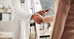 Doctor, patient or handshake in office with tablet for healthcare assessment, welcome or appointment. Medical professional, people and shaking hands with tech for consultation, greeting or thank you.