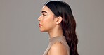 Profile, skincare and woman in studio, beauty and dermatology on gray background. Person, texture and space with shine, cosmetics or grooming with wellness, glowing and aesthetic with treatment