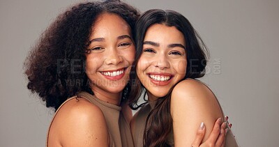Buy stock photo Happy women, portrait and hug with beauty, hair or fashion on a white studio background. Female people, model or smile with embrace for hair style, cosmetics or skincare treatment in salon or spa