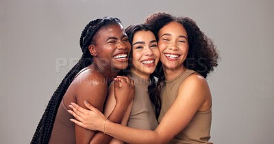 Buy stock photo Happy women, portrait and hug with diversity, beauty or hair for fashion on a studio background. Female people, model or multiracial skin with hairstyle for spa cosmetics, skincare treatment or salon