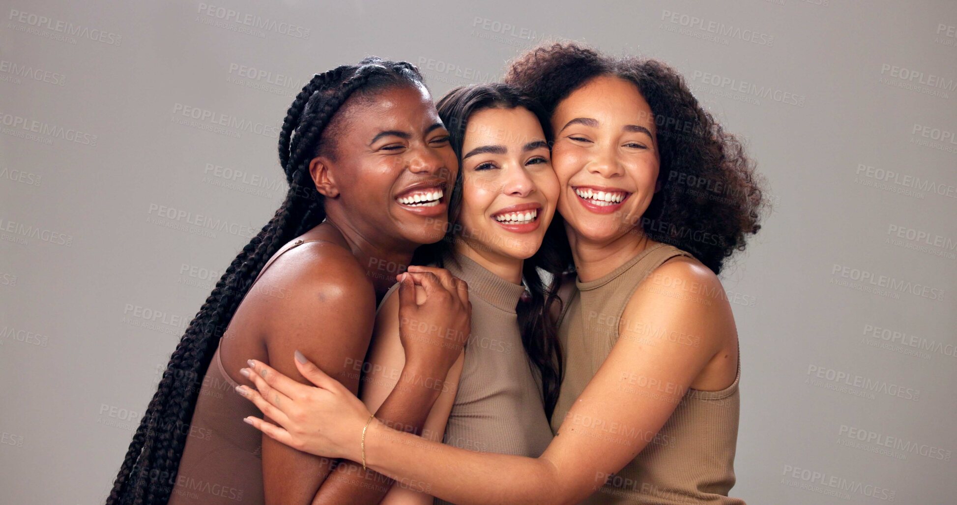 Buy stock photo Happy women, portrait and hug with diversity, beauty or hair for fashion on a studio background. Female people, model or multiracial skin with hairstyle for spa cosmetics, skincare treatment or salon
