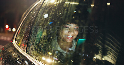 Buy stock photo Night, mobile and woman by car window for travel, journey and social media chat. Phone, taxi passenger and happy person in transport for commute, bokeh or online update for location with rain weather