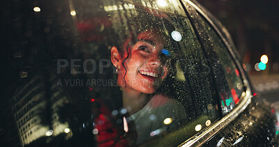 Buy stock photo Smile, woman and window of car at night for travel, sightseeing city and tourism holiday. Happy, passenger and thinking with phone in vehicle, rain weather and urban view for evening journey of trip
