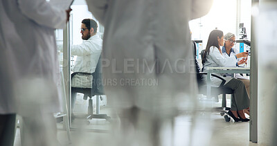 Buy stock photo Development, science and walking with people in laboratory together for medical or pharmaceutical research. Busy, innovation and medicine with scientist team at work on clinical trial or experiment