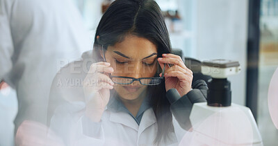 Buy stock photo Scientist, woman and glasses in laboratory for vision, medical research or innovation development. Science, microscope and person with eyewear for safety, protection or eyesight correction with bokeh