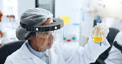 Buy stock photo Scientist, woman and beaker in laboratory for chemistry, research or vaccine development. Science, chemical and person with glass for medical innovation, study liquid or experiment with safety PPE