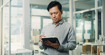Buy stock photo Asian man, stylus and tablet in office for research, editing article and schedule update of draft. Person, digital and review for breaking news, proofreading story and interview notes for publication