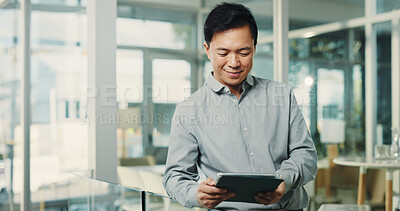Buy stock photo Asian man, reading and tablet in office for research, editing article and schedule update of draft. Person, digital and smile for breaking news, proofreading story and interview notes for publication
