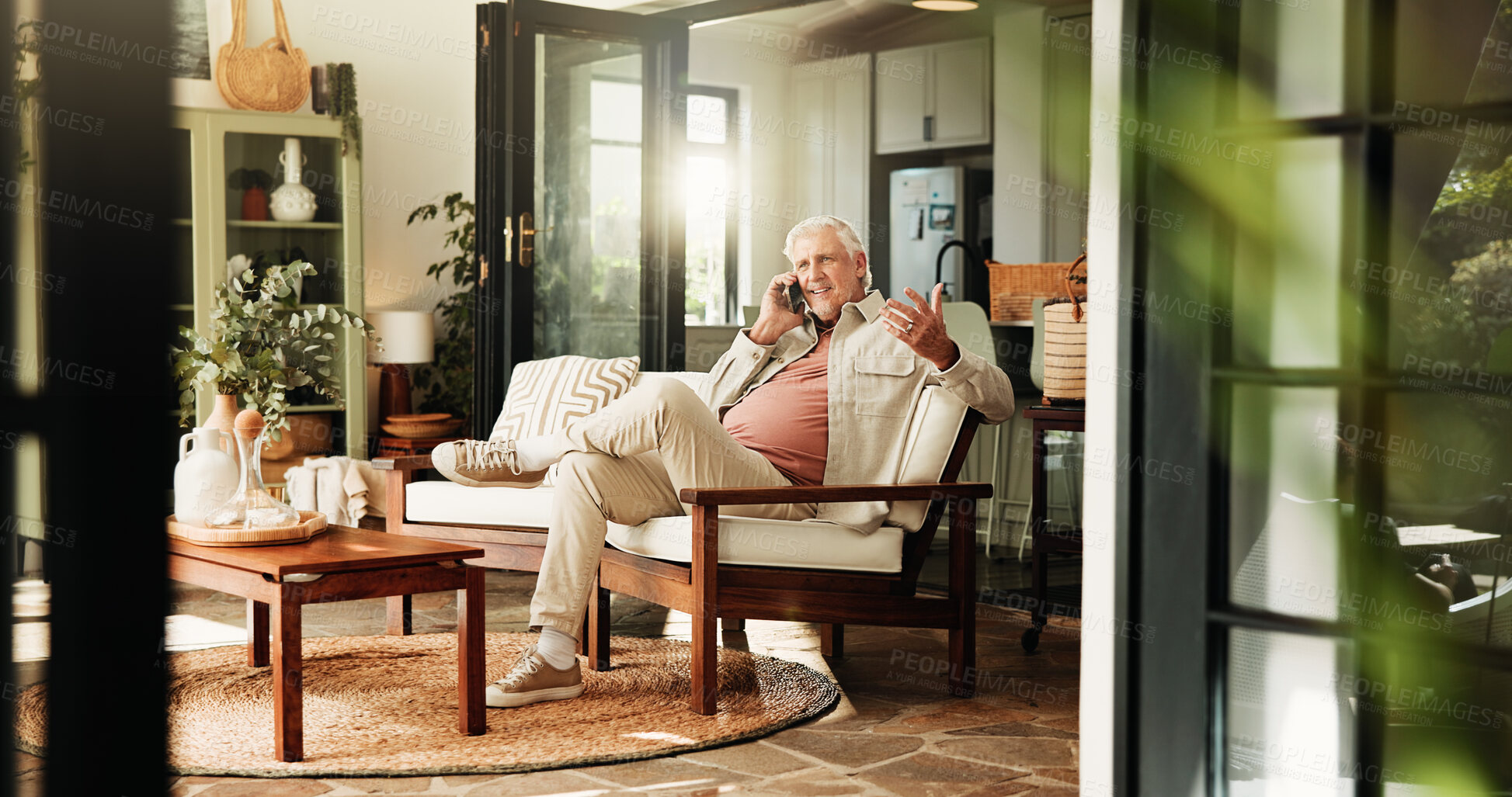 Buy stock photo Senior man, relax and phone call in home for communication, story or chat in retirement. Mobile, smile and elderly person in living room with contact for connection, news or talking with question