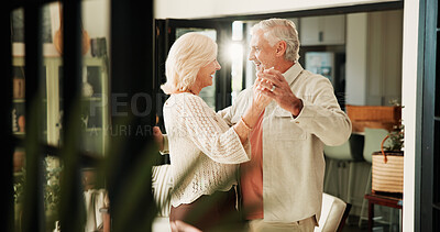 Buy stock photo Elderly couple, love and dance in home for commitment, marriage anniversary and funny. Romantic music, senior man and woman holding hands in house for retirement, healthy relationship and laugh