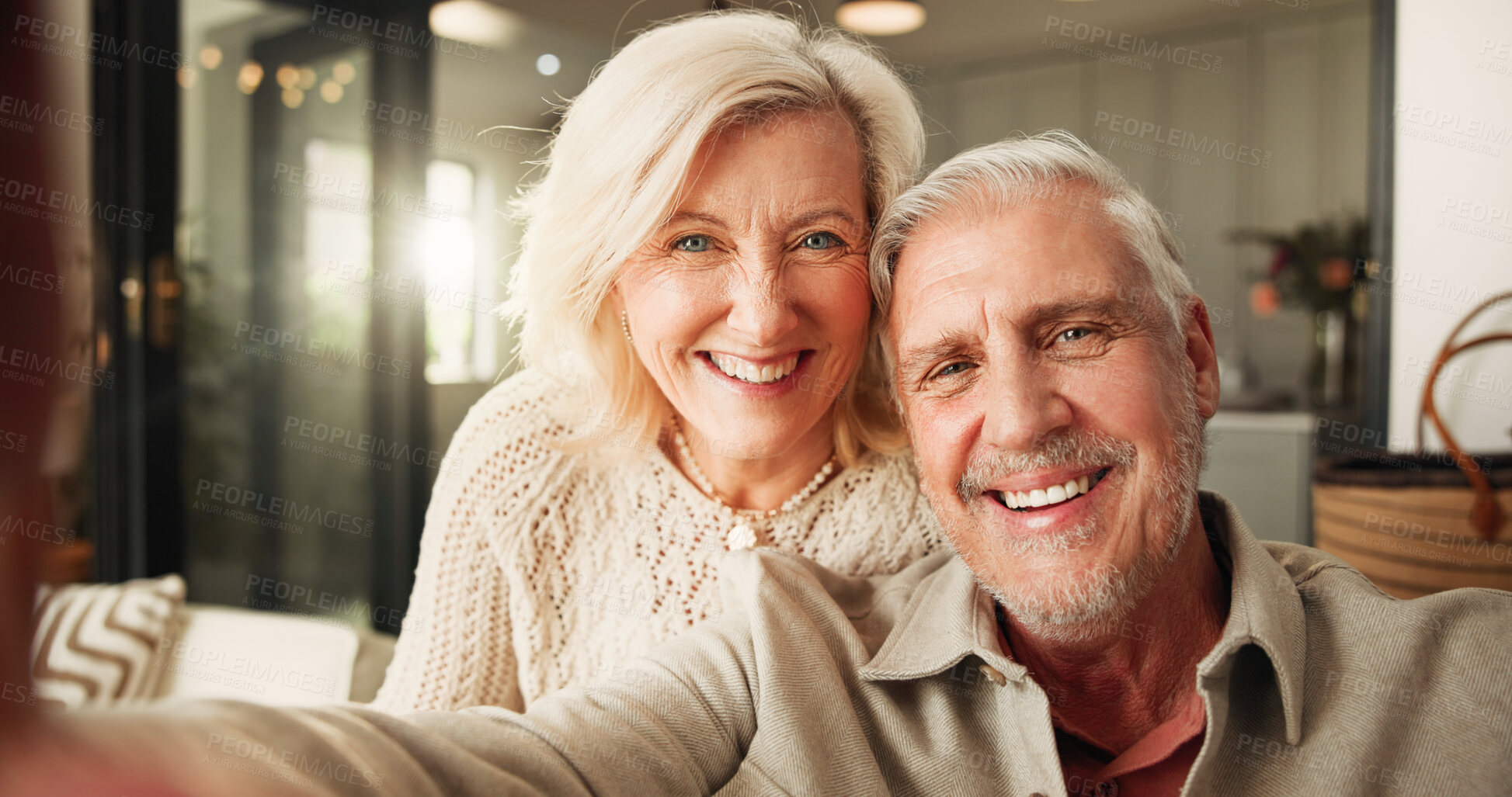 Buy stock photo Senior, happy couple or portrait with selfie in home for photography, memory or picture together. Elderly, man and woman with smile or POV for capture moment, post or social media in retirement house