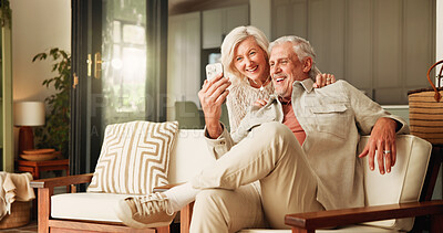 Buy stock photo Laughing, relax and selfie with old couple in living room of home together for break or wellness. App, moment and photograph with funny senior people in apartment for bonding, me time or retirement