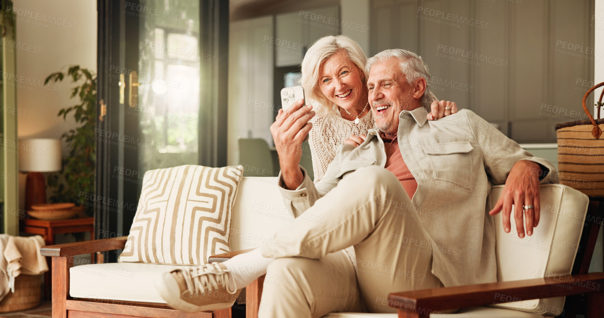 Buy stock photo Laughing, relax and selfie with old couple in living room of home together for break or wellness. App, moment and photograph with funny senior people in apartment for bonding, me time or retirement