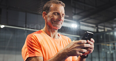 Buy stock photo Sport, fitness and man with phone on court for padel online score, track performance or game break. Tennis player, mature person and happy with smartphone at indoor club for practice schedule or chat