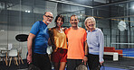 Padel, hug and portrait of people on court for tournament club, challenge and support. Happiness, fitness team and sports athlete with mature couple of friends on turf for training, smile and game