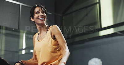 Buy stock photo Padel, serve and smile with woman on court for workout, training and tournament club. Competition practice, exercise and challenge with low angle of mature person on turf for game and sports athlete