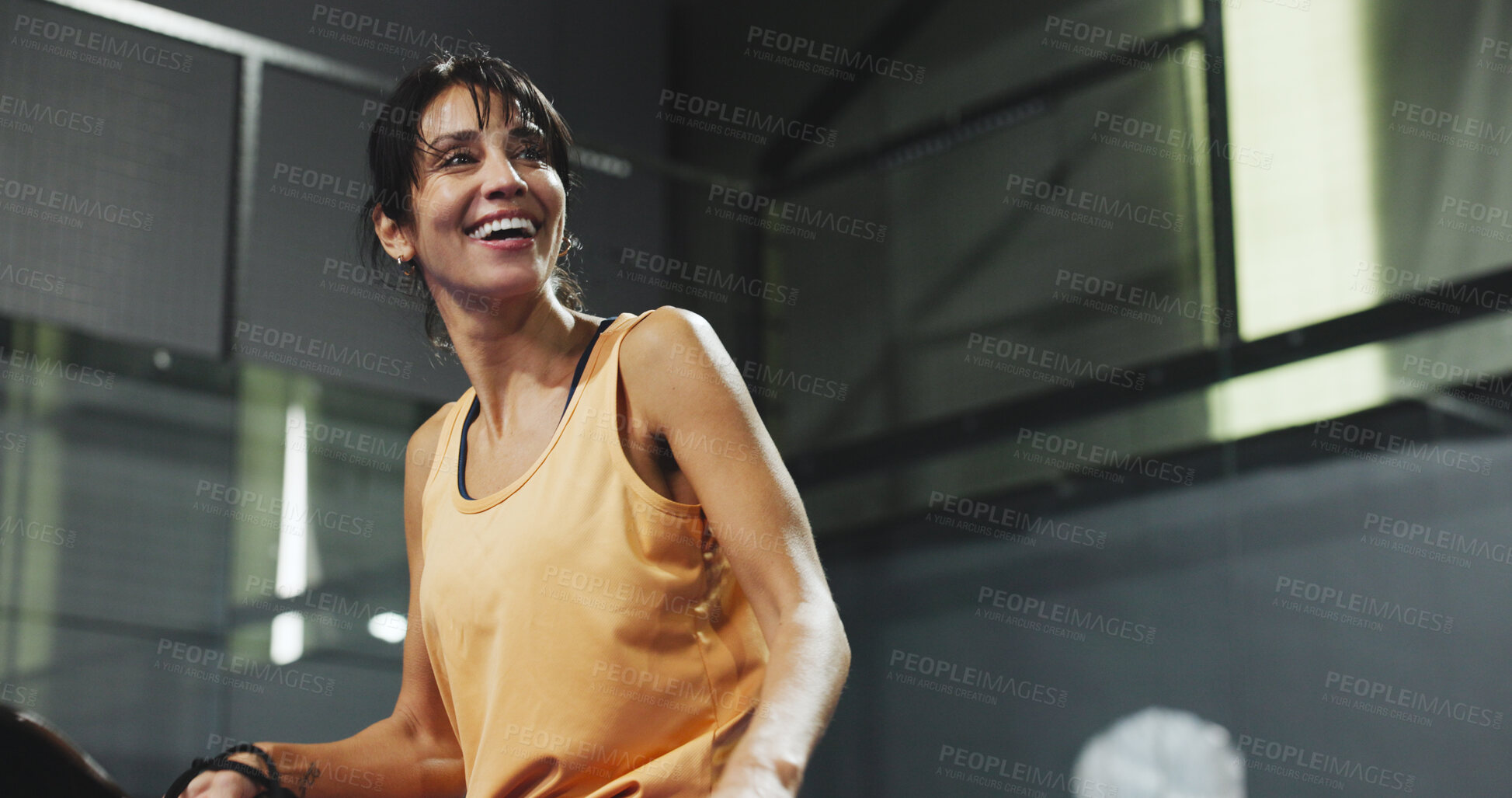 Buy stock photo Padel, serve and smile with woman on court for workout, training and tournament club. Competition practice, exercise and challenge with low angle of mature person on turf for game and sports athlete
