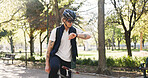 Watch, courier and bike with man in park for deliver schedule, time management and carbon footprint. Shipping deadline, eco friendly transport and shipment with person outdoor for cycling and travel