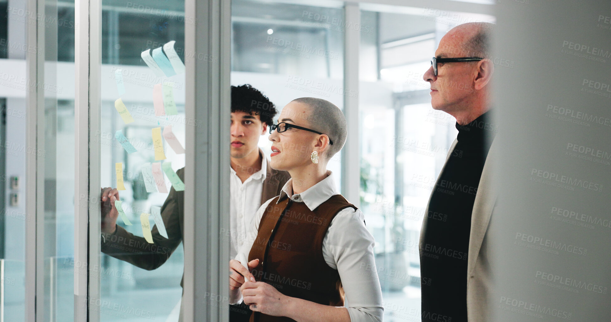 Buy stock photo Collaboration, glass wall and planning with business people in office together for project management. Brainstorming, sticky notes and teamwork with employee group in corporate workplace for meeting