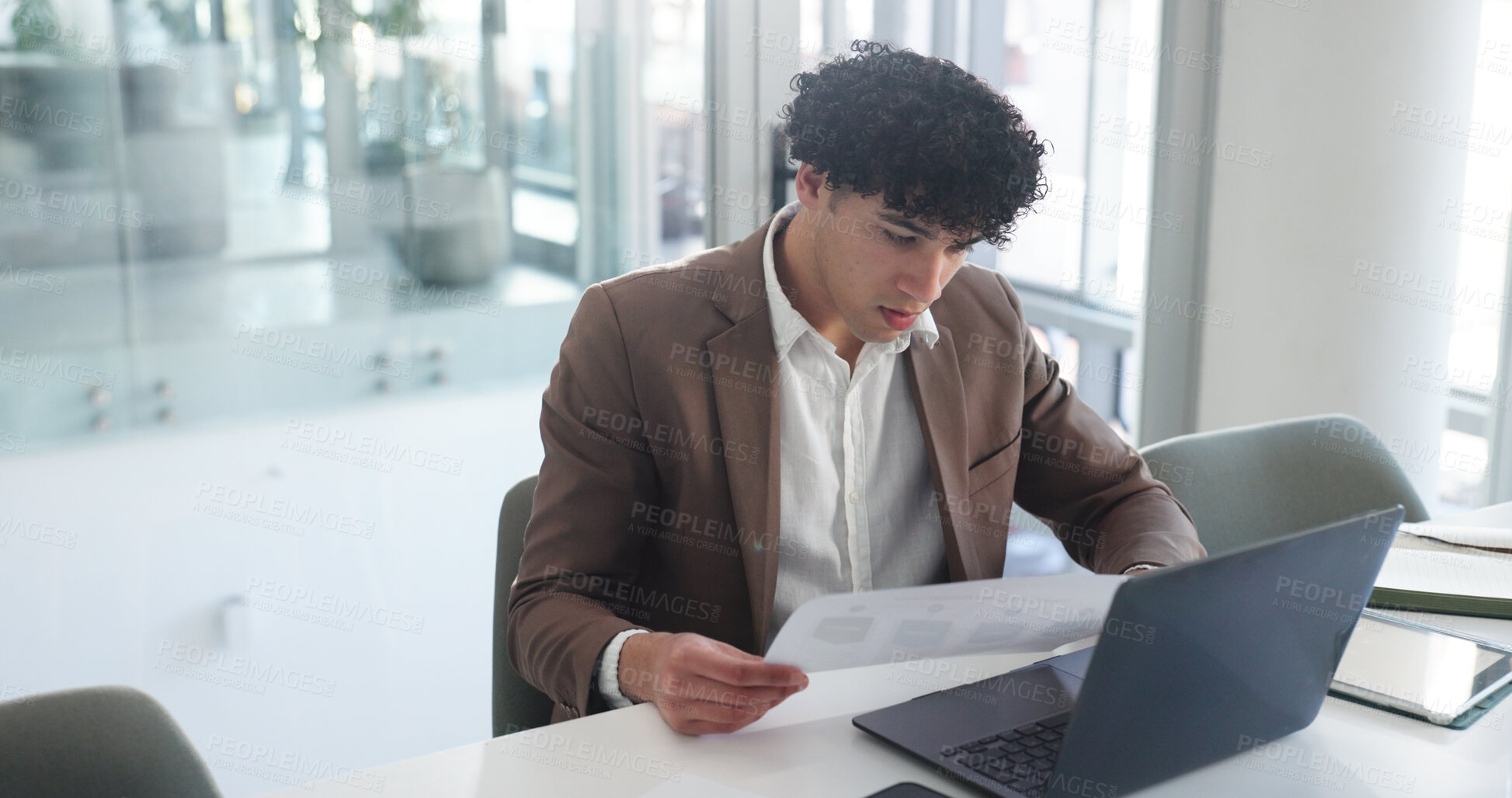 Buy stock photo Laptop, documents and review with business man in office for insurance broker, risk assessment and research. Planning, premium policy and underwriter with person in agency for claims coverage payout