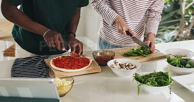 Buy stock photo Cooking, hands and pizza with friends in kitchen of home together to follow online recipe tutorial. App, tablet and video instructions with roommates in apartment for food or meal preparation