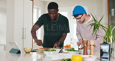 Buy stock photo Cooking, food and pizza with people in kitchen of home together to follow online recipe tutorial. App, tablet and video instructions with roommate friends at counter in apartment for meal preparation