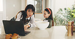 Mother, child or baking in kitchen with laptop for instructions, conversation or bonding together. Daughter, baker or parent teaching with computer, muffin recipe discussion or browse website in home