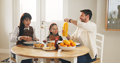 Buy stock photo Breakfast, juice and smile with happy family in dining room of home together for meal or nutrition. Bonding, drink or food with mother, father and daughter in apartment for diet, health or hunger