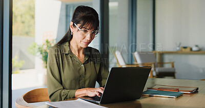 Buy stock photo Business, woman and typing with laptop at house for real estate, property report and research. Mature freelancer, pc and paperwork for sales agreement, listing information and negotiation statement