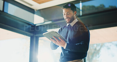 Buy stock photo Man, realtor and tablet in office for research, property management and service review. Low angle, estate agent and digital tech in agency for commission update, app scroll and smile for reading