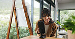 Home, painter and woman with cellphone, influencer and live streaming with content creator. Online app, artist or mature person with canvas, smartphone or fans engagement with tips or showcase craft