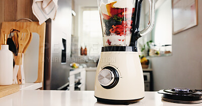 Buy stock photo Fruits, blender and table for smoothie in kitchen for healthy drink, protein shake and nutrition. Machine, counter and organic ingredients for weight loss, diet milkshake and detox benefits at house