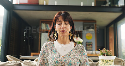 Buy stock photo Anxiety, eyes closed or woman in house with breath, spiritual or zen practice for worry. Mental health, mature or female person on sofa with meditation, mindset or holistic approach for stress relief