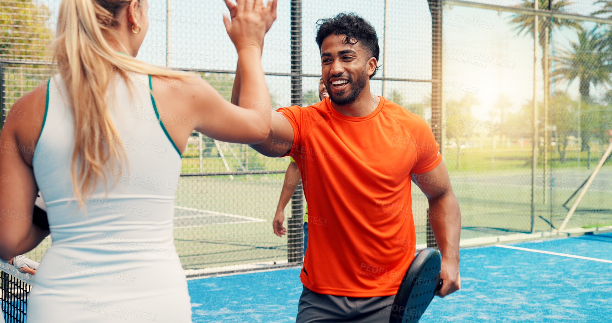 Buy stock photo Sport, padel and team with high five on court for competition match, game winner and sportsmanship. Tennis players, happy people and celebration at fitness club for friendly tournament and practice