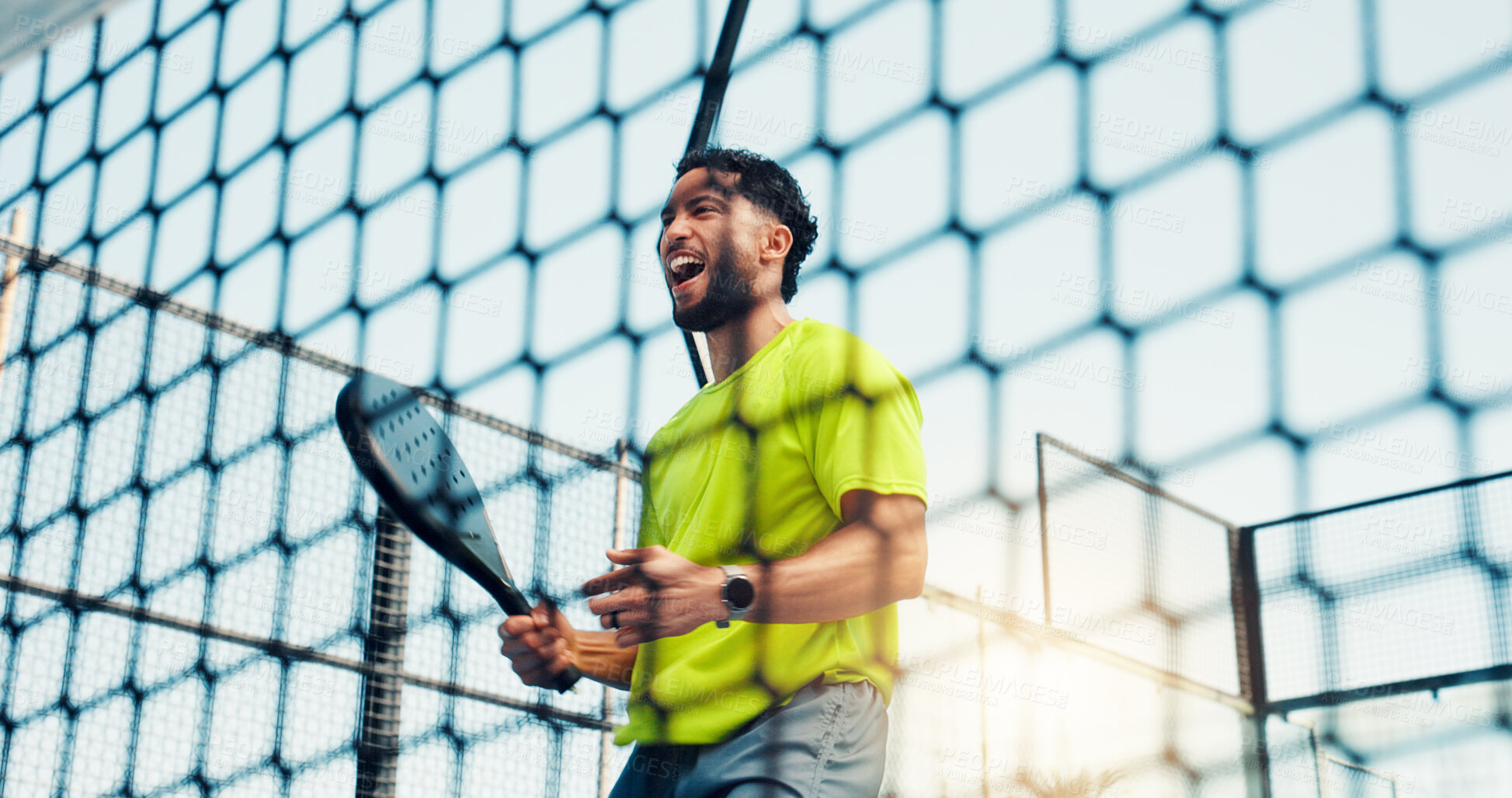 Buy stock photo Padel, winner and fitness with excited with man on court for sports athlete, success and tournament club. Target, competition and tennis player or person at net for exercise, game and low angle