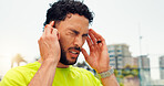 Frustrated man, headache and sport with vertigo in city for dizziness, mental health or strain. Tired, male person or athlete with sore head, pain or migraine for pressure or overworked in urban town